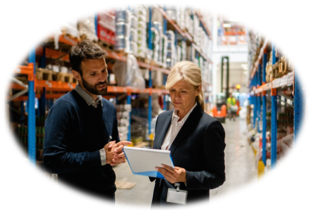Man and lady in warehouse taking inventory. Man and lady in warehouse taking inventory.